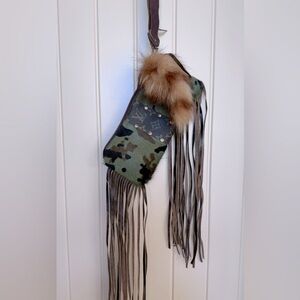 Camo print hair on wristlet with LV logo motif